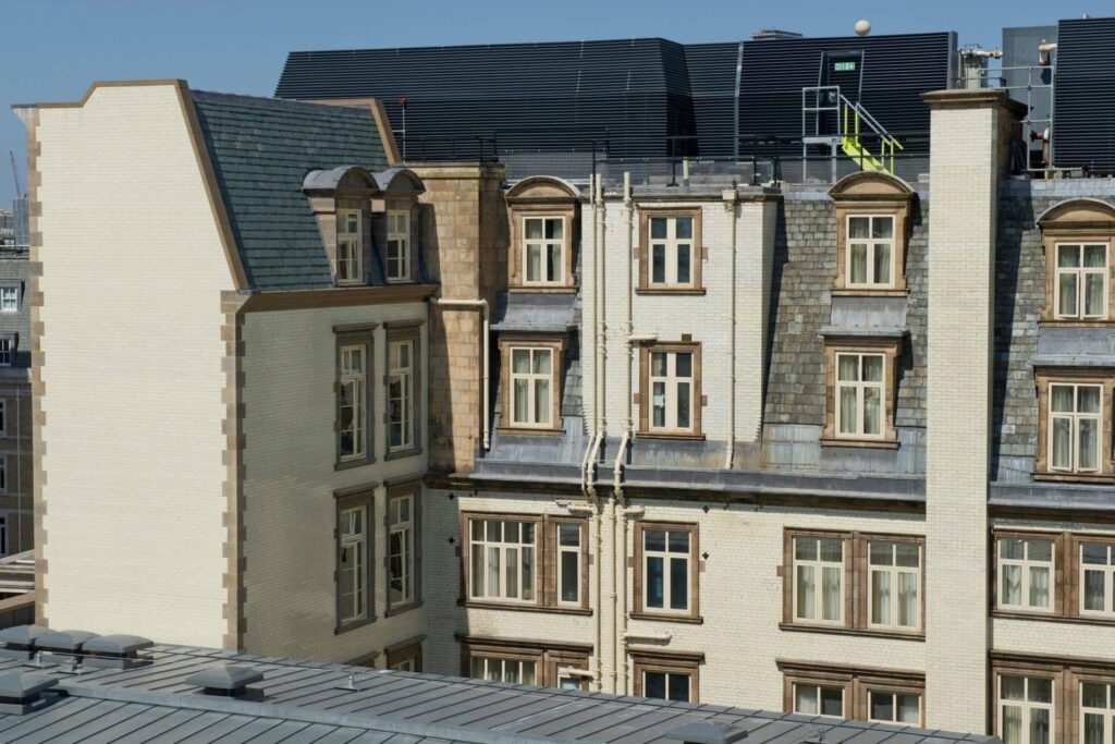 An aerial view of a building with many windows.