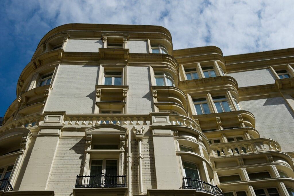 A large building with many windows and balconies.