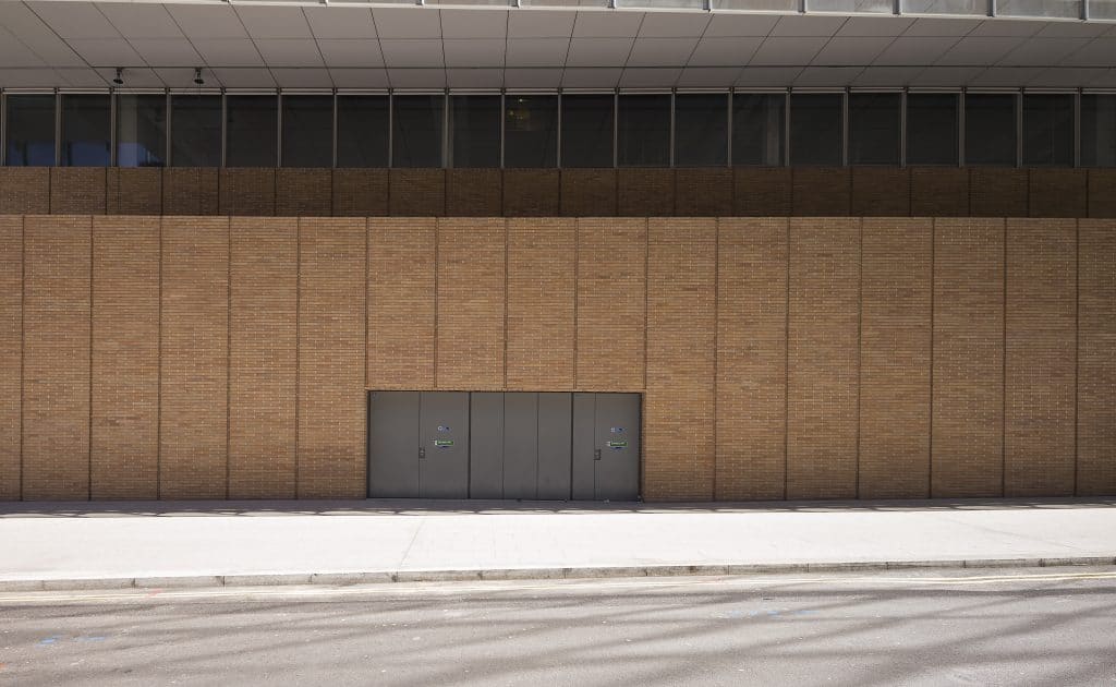 A building with a door on the side of it.