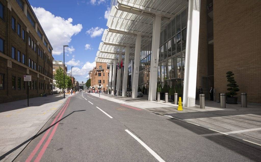 A street in london with a building in the background.