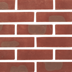 A red brick wall with a green background.