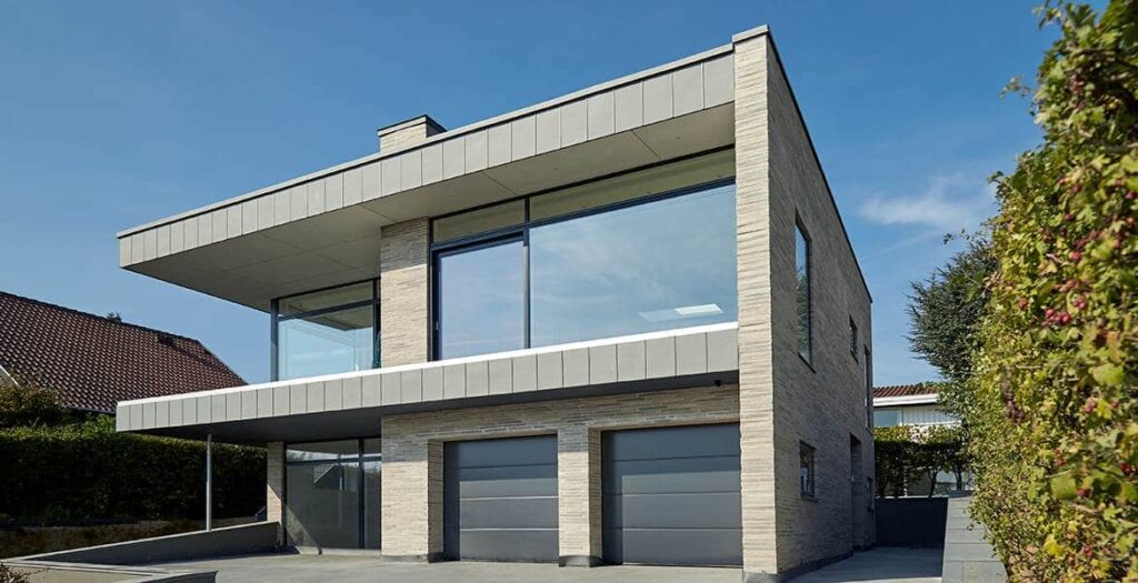A MCPN034 with two garages and a driveway.