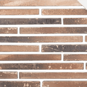 An image of a brown and green brick wall.