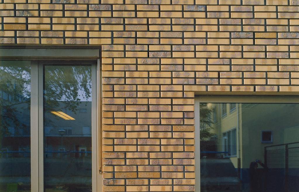 close up brick by window and door