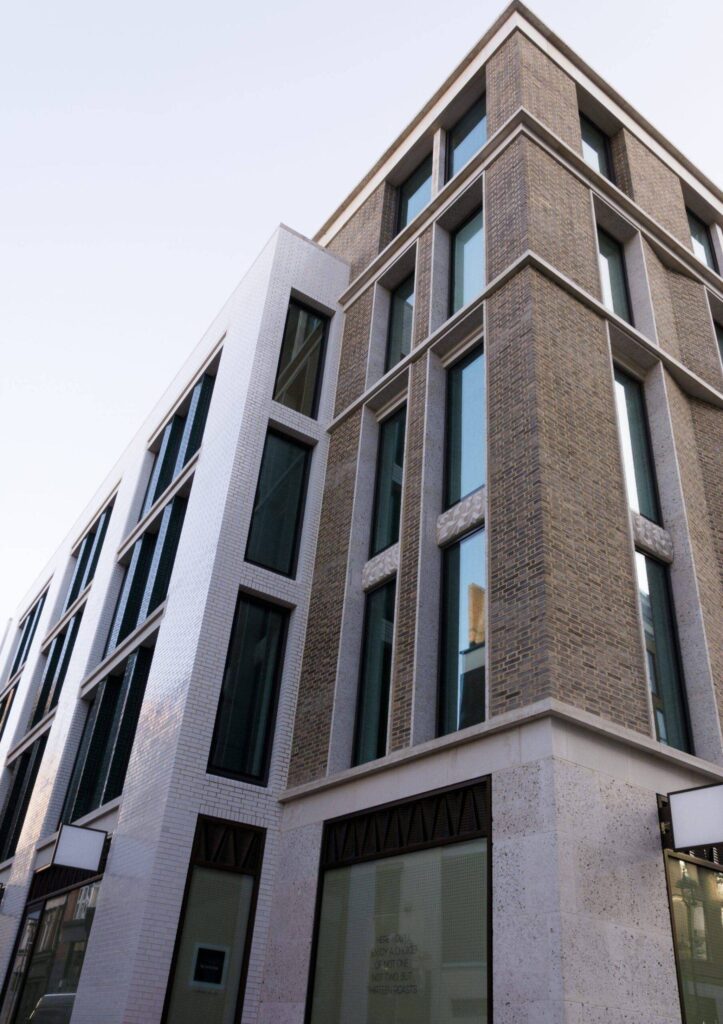 The exterior of a building with MCPM093 windows.