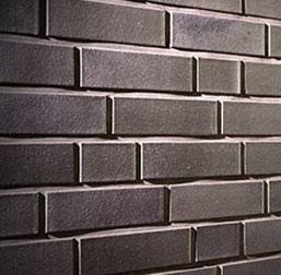 wall of glazed brick slips