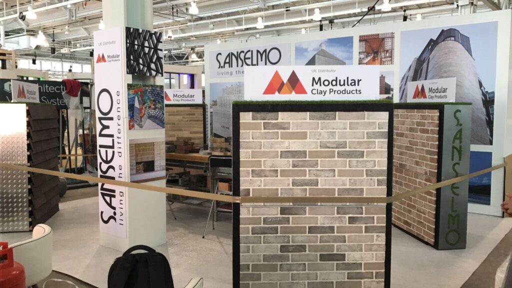 A display of bricks and other materials at a trade show.