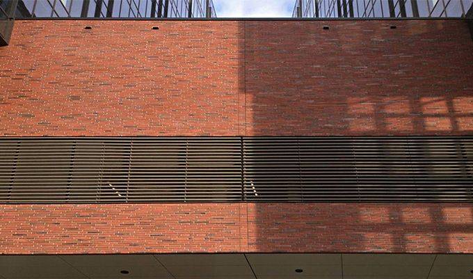 A building with a MCPH036 wall and slats.