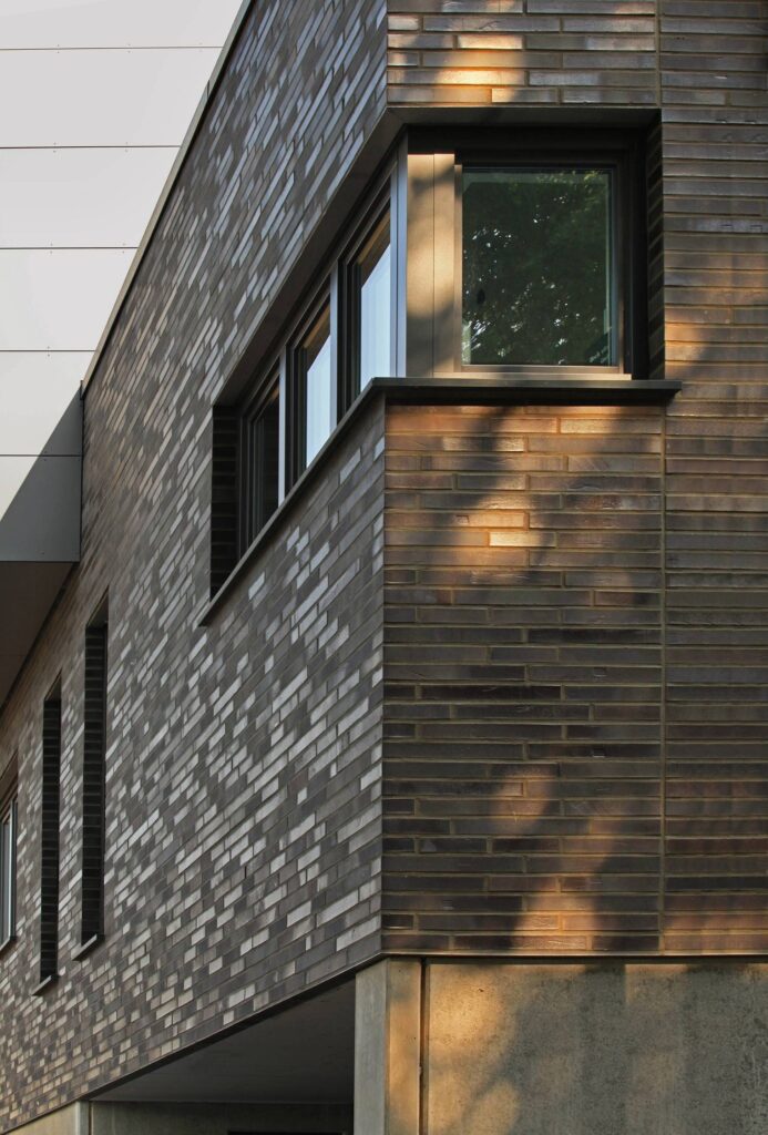 A modern house with MCPH038 siding and windows.