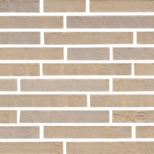 A close up of a brick wall with a beige color.
