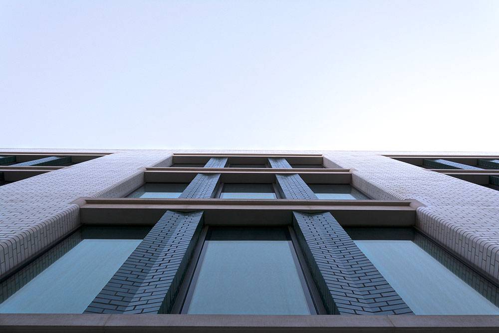 The top of a building with windows.
