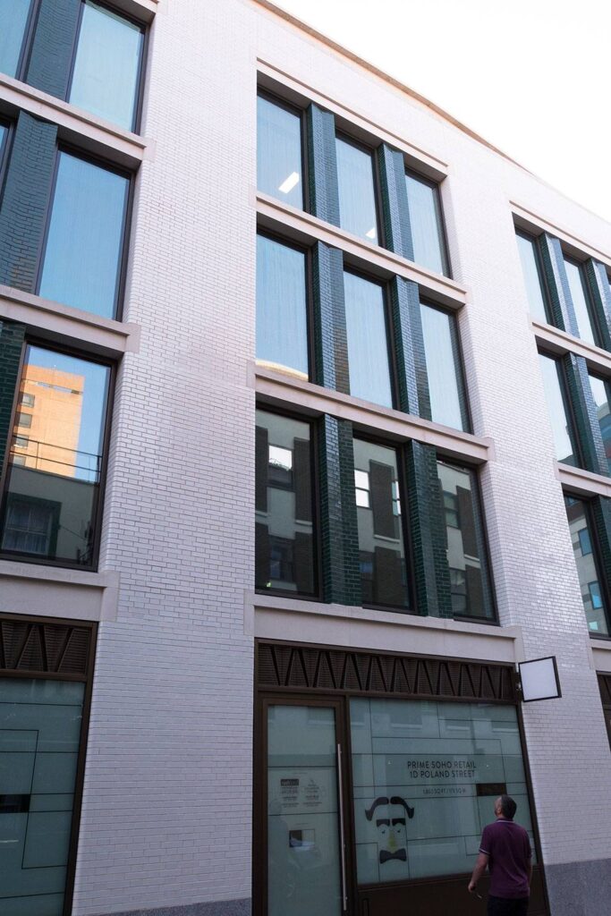 A white building with windows.