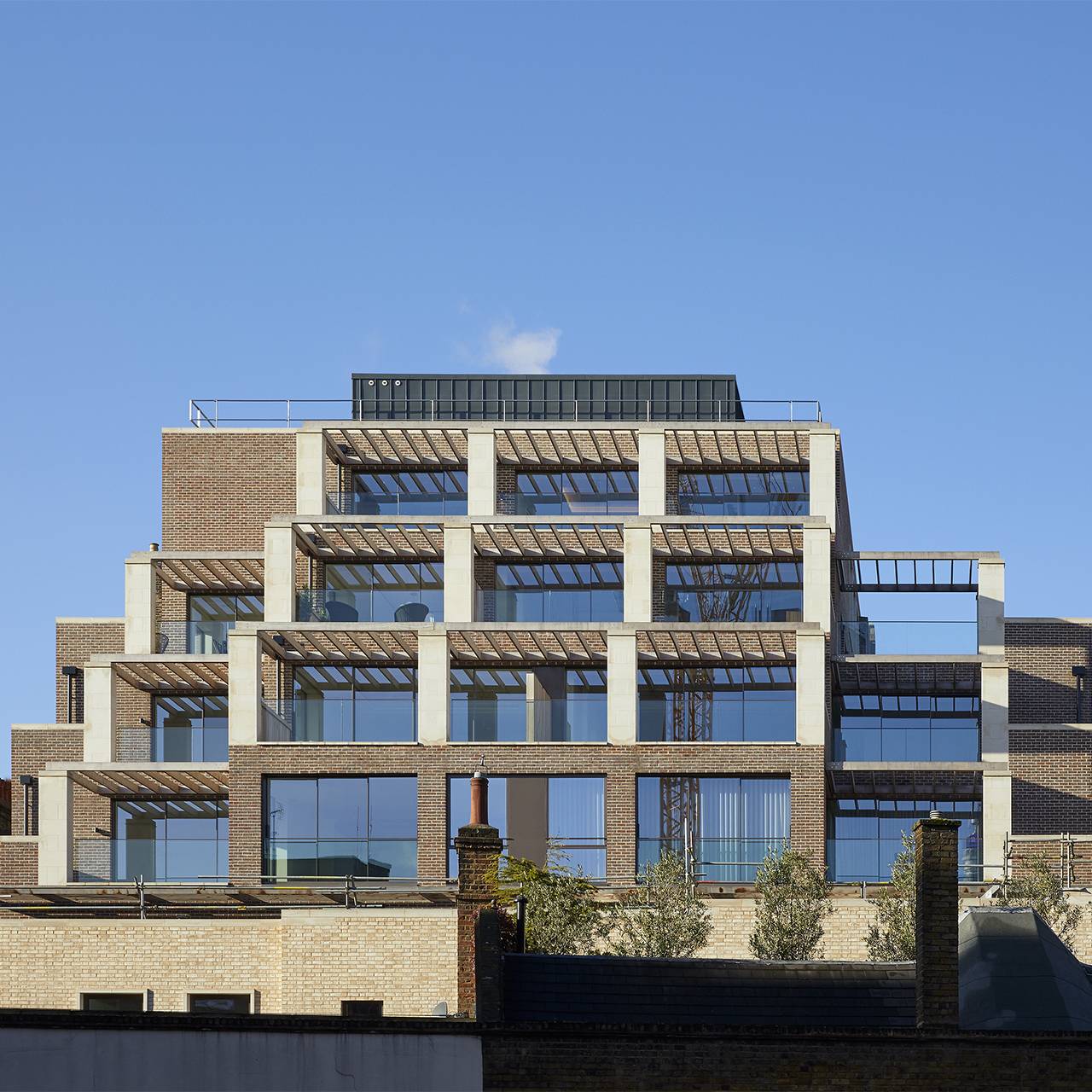 An office building on a hillside.