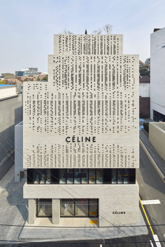 Exterior view of the celine flagship store, a modern urban building with a patterned facade.