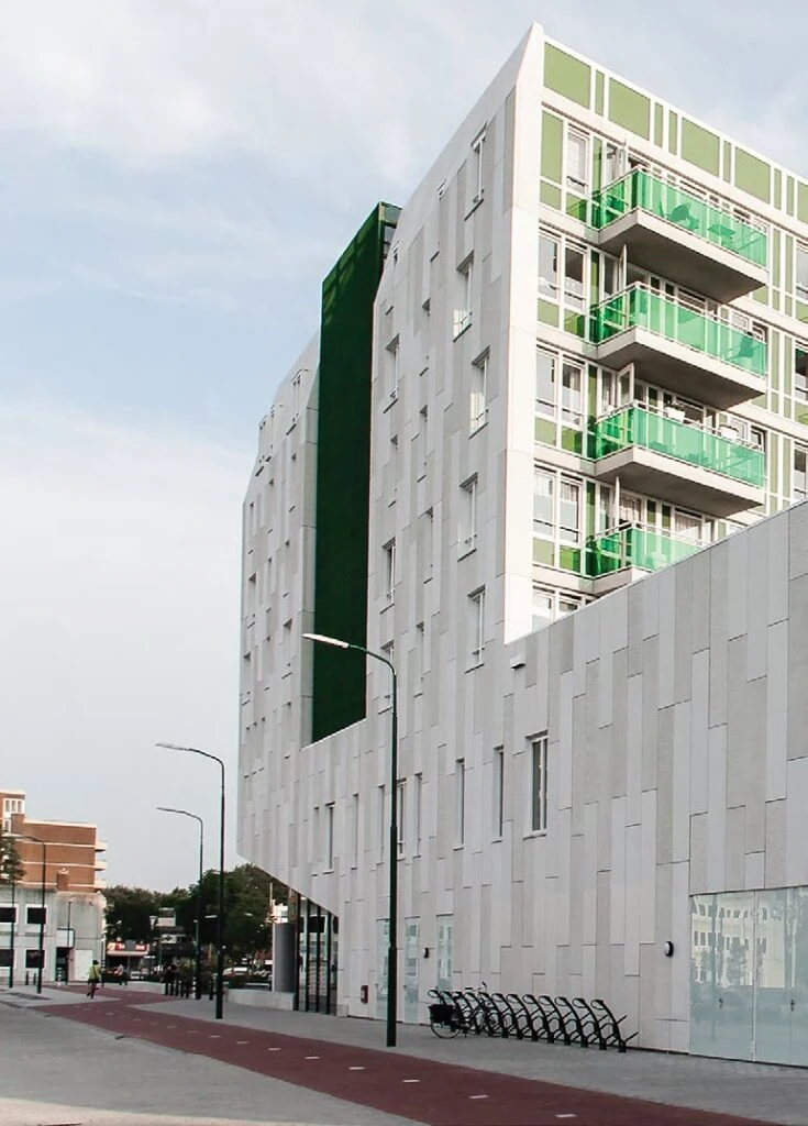 A building with green balconies.